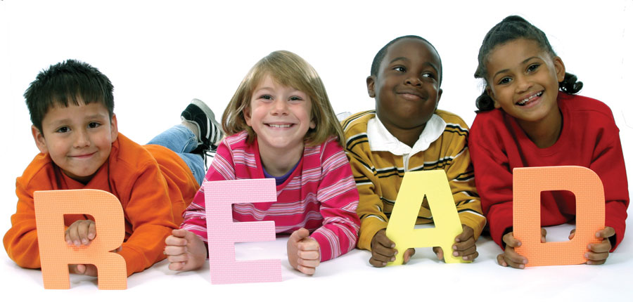 Children holding letters that say "read".